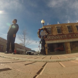 EZPZ's Head Game Coach standing on a corner in Winslow, AZ.